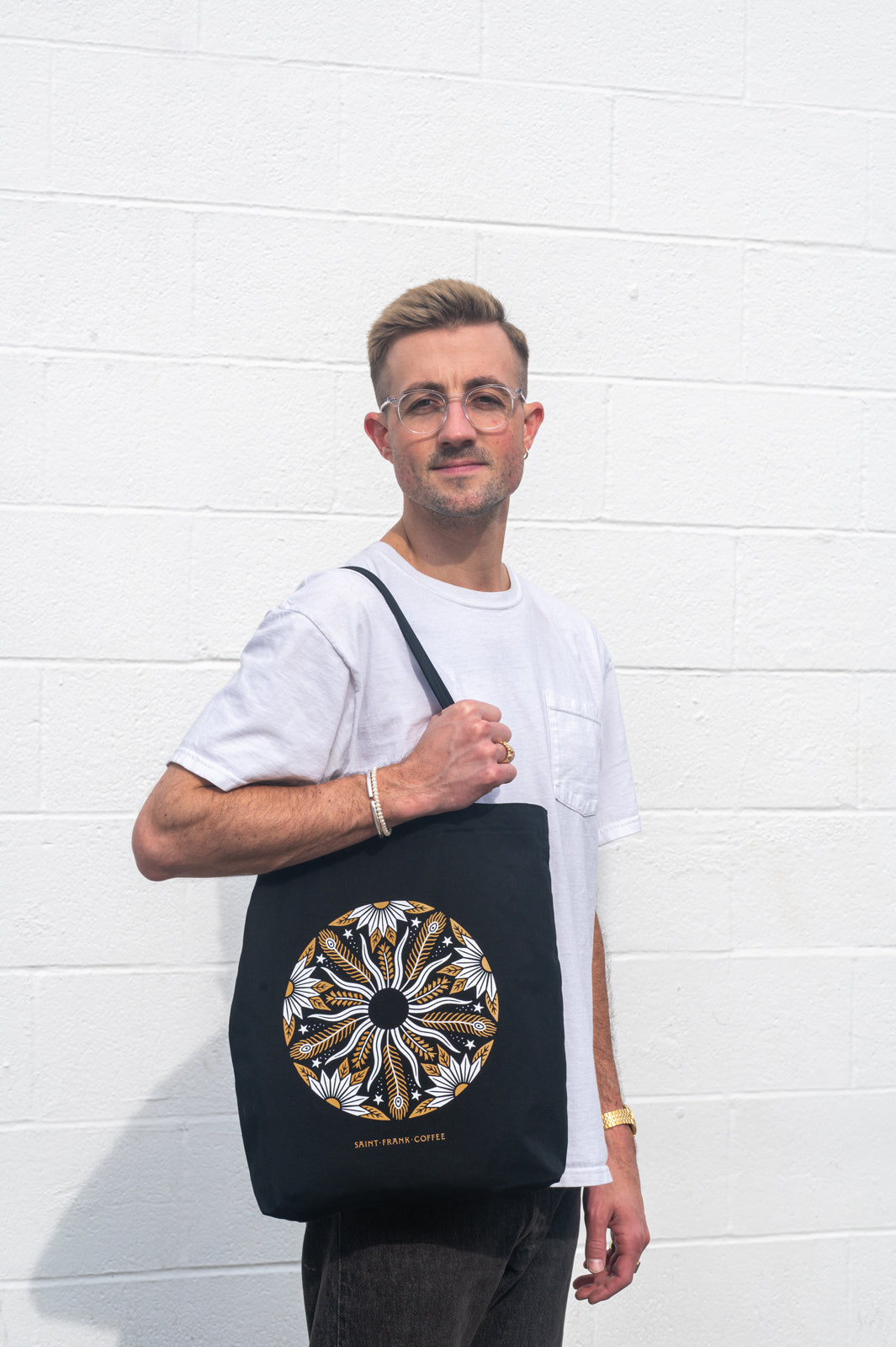 Man holding Brother Sun Baggu Tote