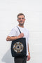 Man holding Brother Sun Baggu Tote