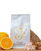 Colombia Finca Quinua coffee bag surrounded by nougat and oranges