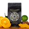 Brother Sun coffee bag surrounded by Oranges, Apricots, and Lime