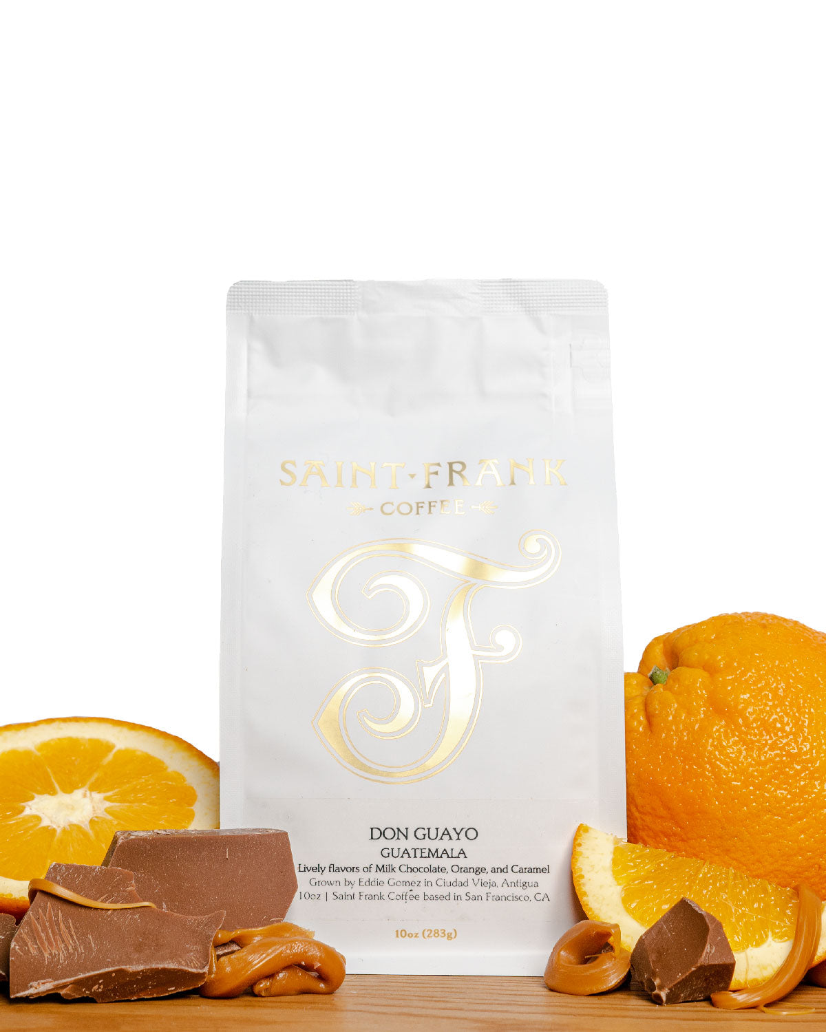 Don Guayo coffee bag surrounded by oranges, chocolate, and caramel