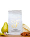 Coffee bag surrounded by Pears, Apricot, and Flowers