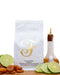 Coffee bag surrounded by Dried Apricot, Lime, and Orange Bitters