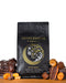 Sister Moon coffee bag surrounded by Chocolate and Caramel